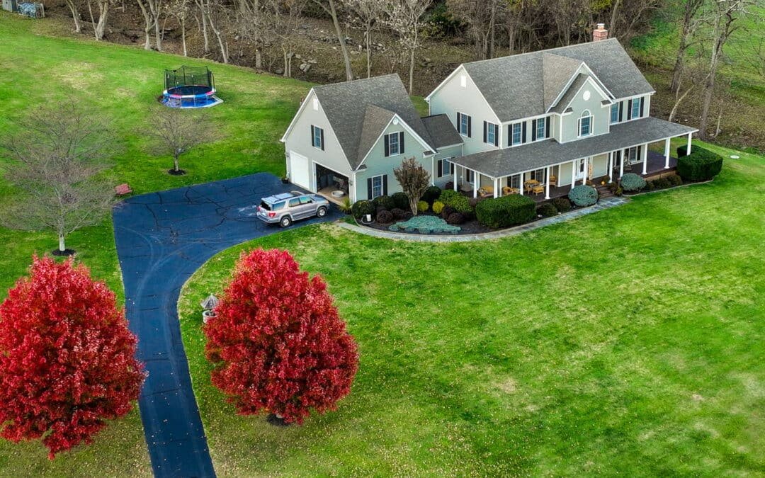 Aerial view of a modern suburban home captured by drone photography.