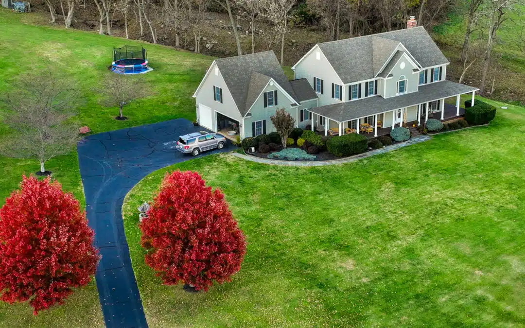 Aerial view of a modern suburban home captured by drone photography.